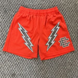 EE orange/green lightning bolts shorts